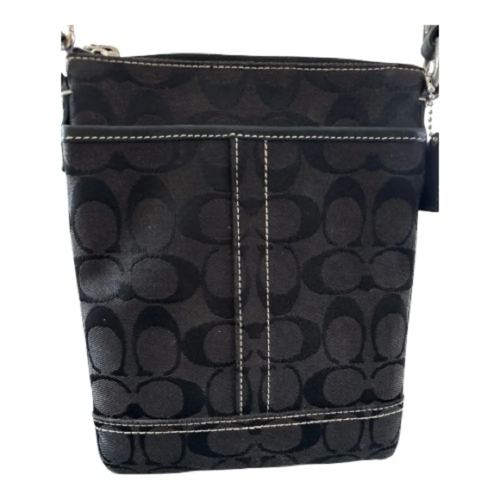 COACH vintage crossbody bag, jacquard black, adjustable strap, zipper top.